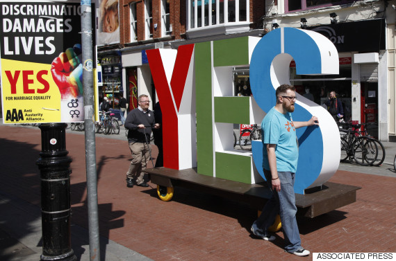 Members of the Yes Equality campaign begin canvassing in the center of Dublin, Ireland, Thursday May 21, 2015. People from across the Republic of Ireland will vote Friday in a referendum on the legalization of gay marriage, a vote that pits the power of the Catholic Church against the secular-minded Irish government of Enda Kenny. (AP Photo/Peter Morrison)