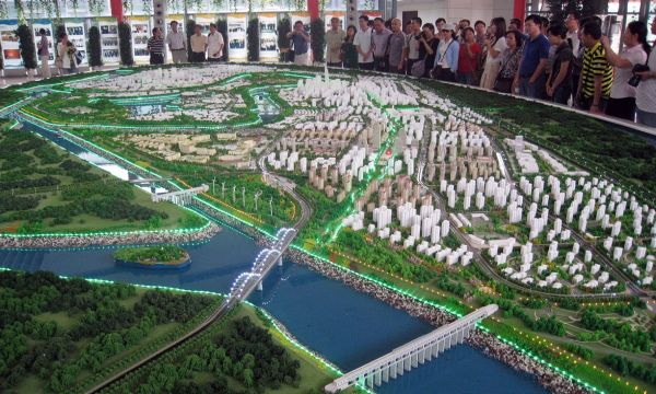 The Guardian/Allison Jackson/AFP/Getty Images. Didascalia: Model of Tianjin eco-city